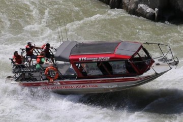 a small boat in a body of water